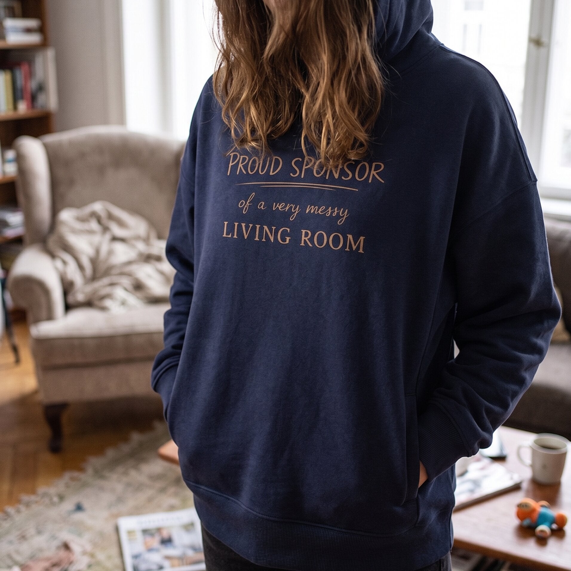 ‘PROUD SPONSOR of a very messy LIVING ROOM’ Statement Hoodie