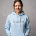 Kiksy sky blue organic cotton hoodie for women featuring gentle parenting slogan printed on front.