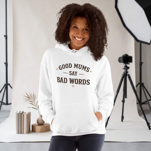 Kiksy white hoodie with Good Mums Say Bad Words printed on the front worn by a smiling woman
