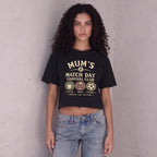 Kiksy black cropped t-shirt for women featuring a graphic print that reads Mum's Match Day Survival Club.