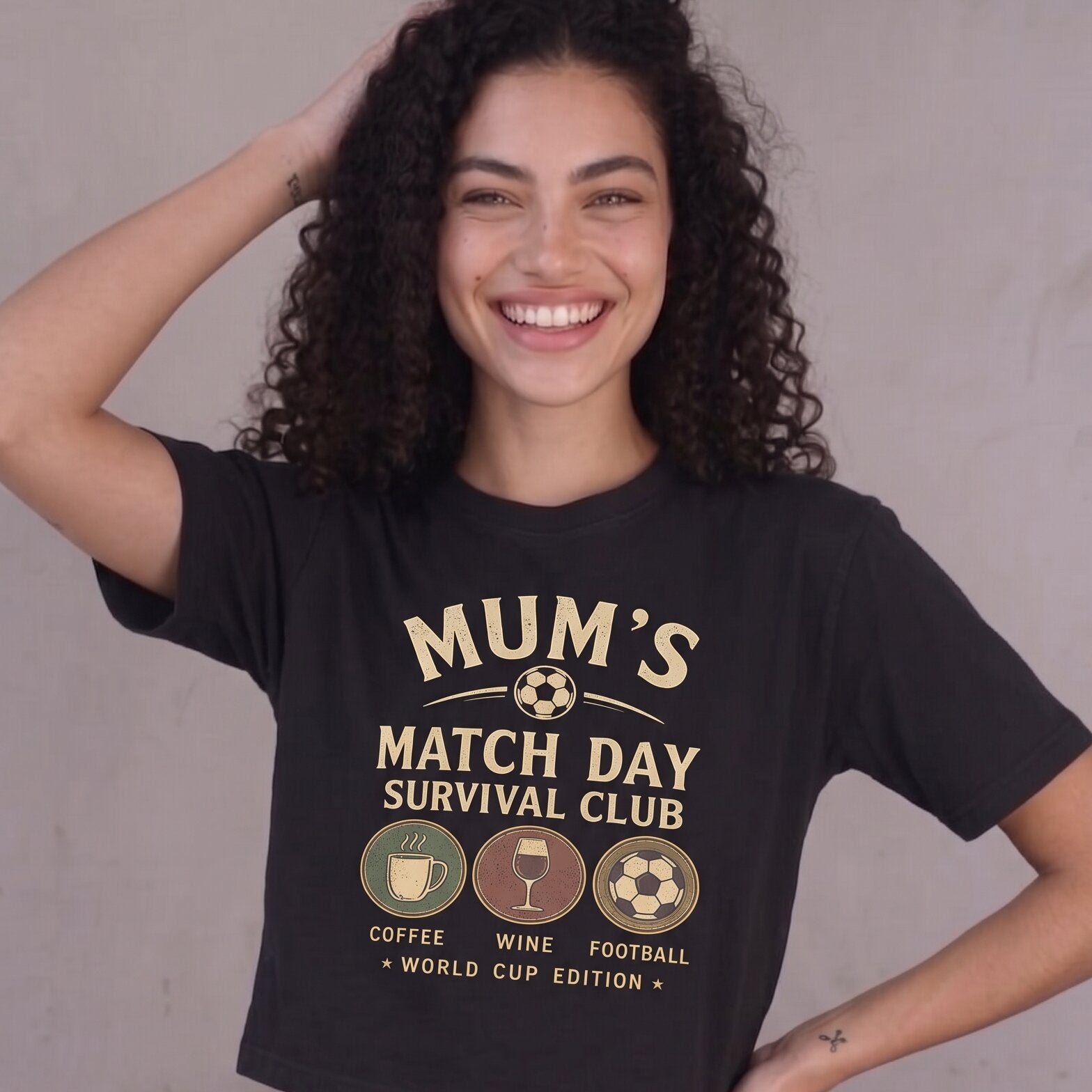 Kiksy black cropped t-shirt for women featuring a graphic print that reads Mum's Match Day Survival Club.