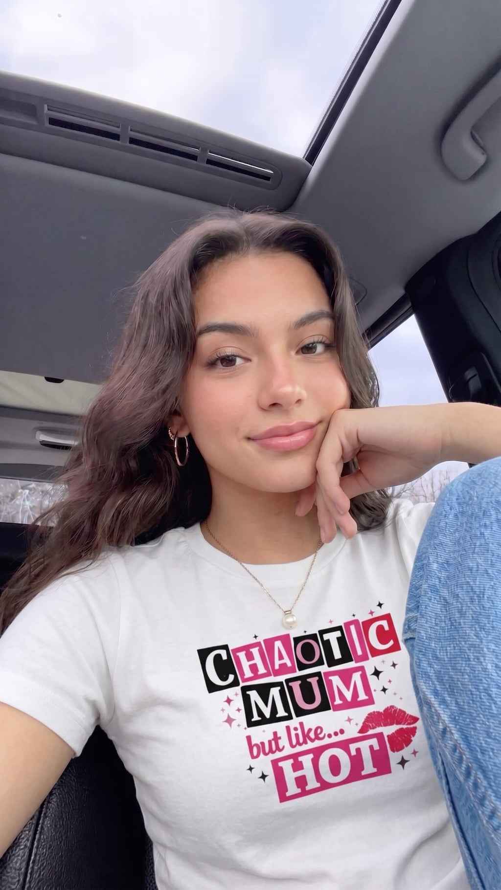 Kiksy white cotton slogan t-shirt featuring Chaotic Mum but like Hot graphic print styled with jeans.