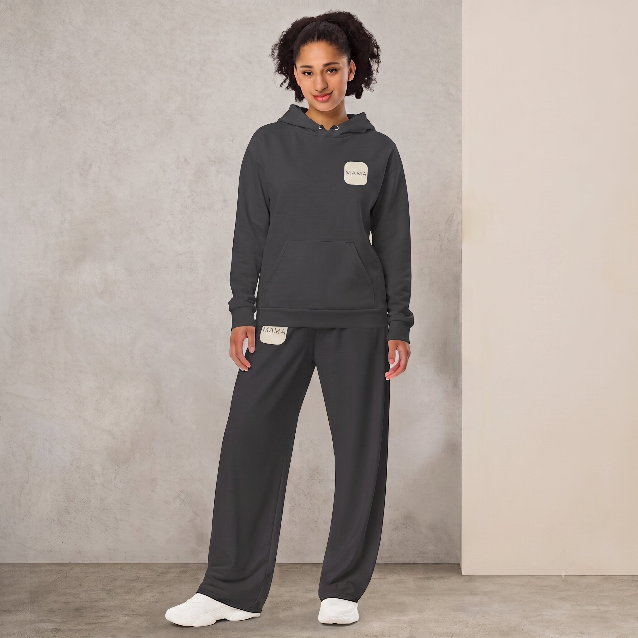 Kiksy Mama matching tracksuit set in graphite grey featuring a fleece hoodie and wide-leg joggers on model from graphite-matching-set-mama-hoodie-side.jpg