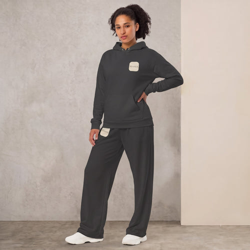 Kiksy Mama matching tracksuit set in graphite grey featuring a fleece hoodie and wide-leg joggers on model from graphite-matching-set-mama-hoodie-side.jpg